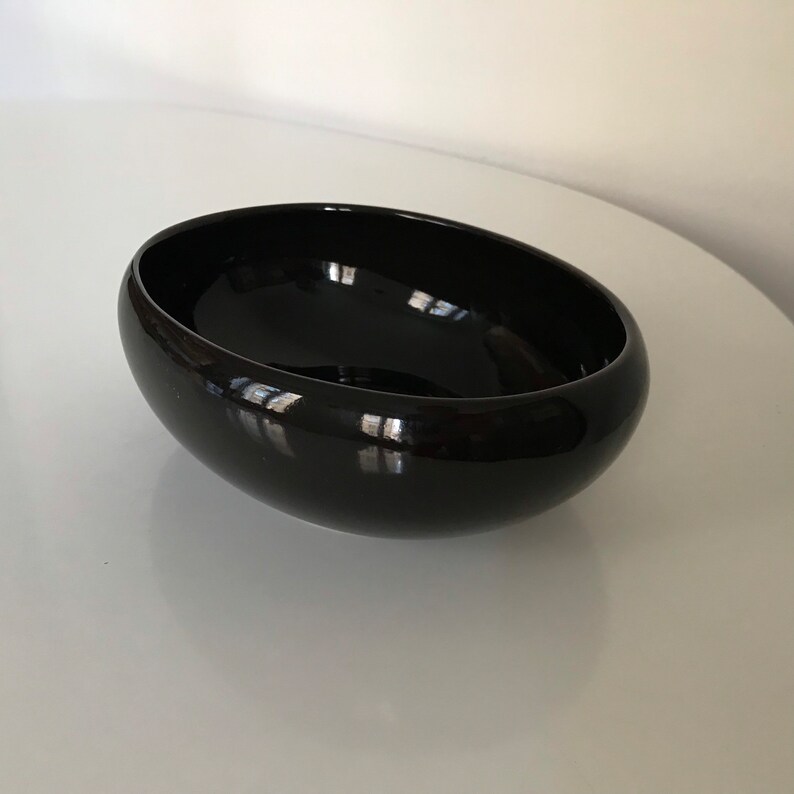 50` Vintage black bowl  by Kaj Franck